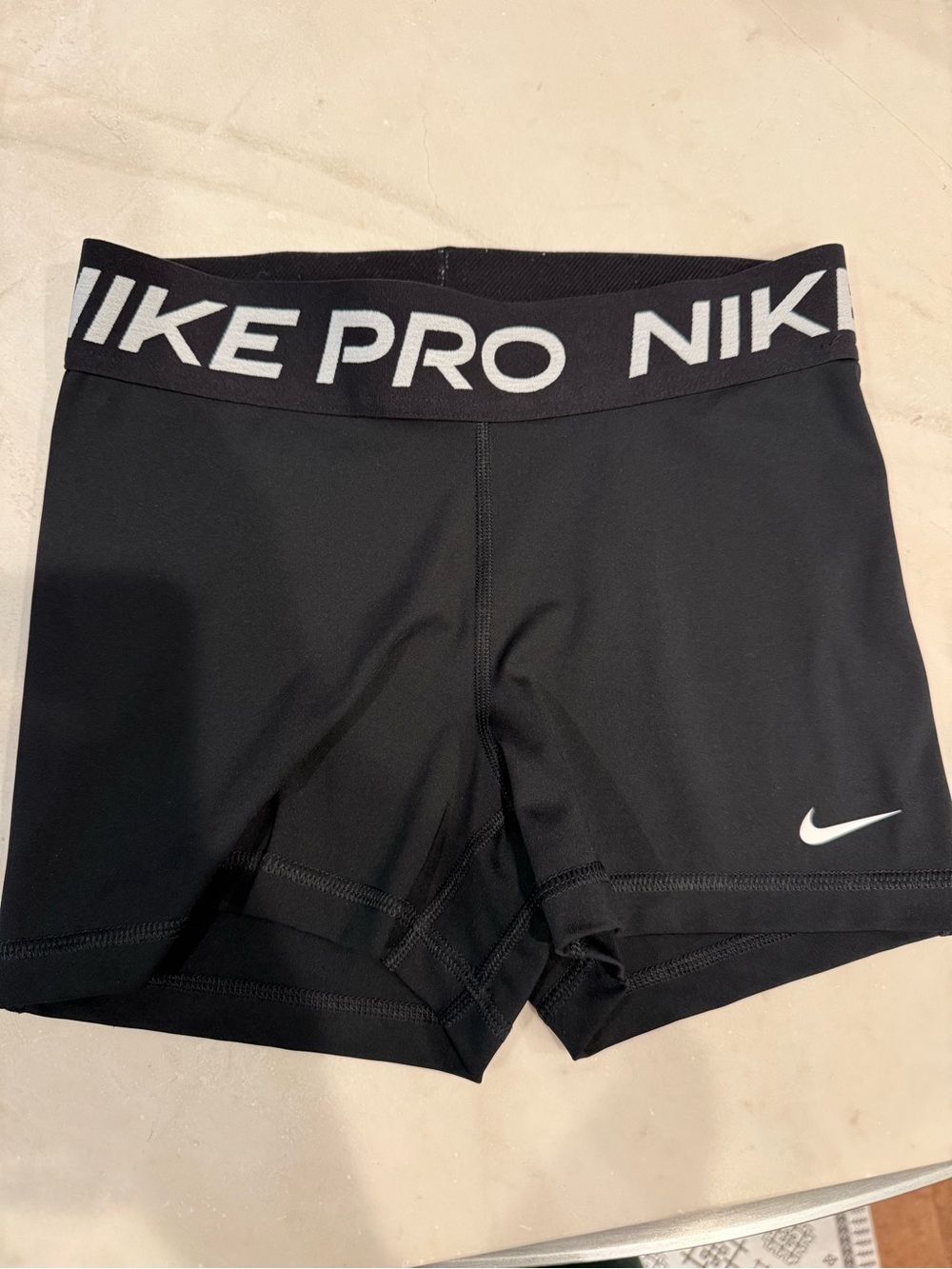 Nike Black Performance Compression Shorts with White Swoosh